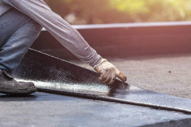 Professional Basement Waterproofing technician working in Dalton, PA